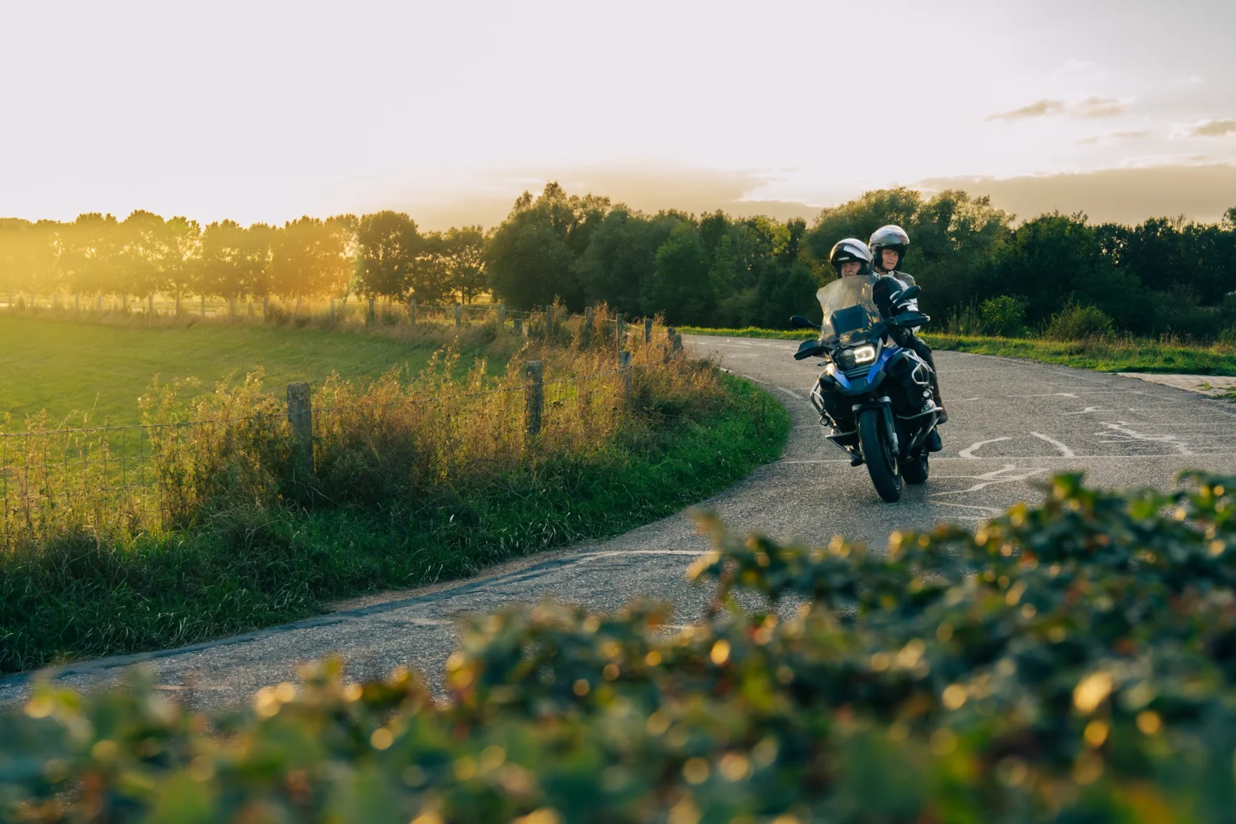 Motorcycle rider on a winding road